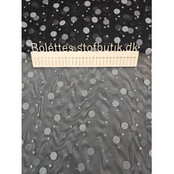 Sort tyl med slv pletter