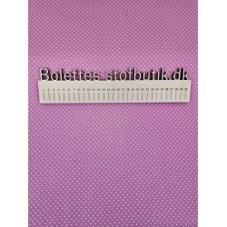 Fast bomuld med hvide prikker p pink baggrund