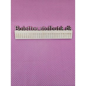 Fast bomuld med hvide prikker p pink baggrund